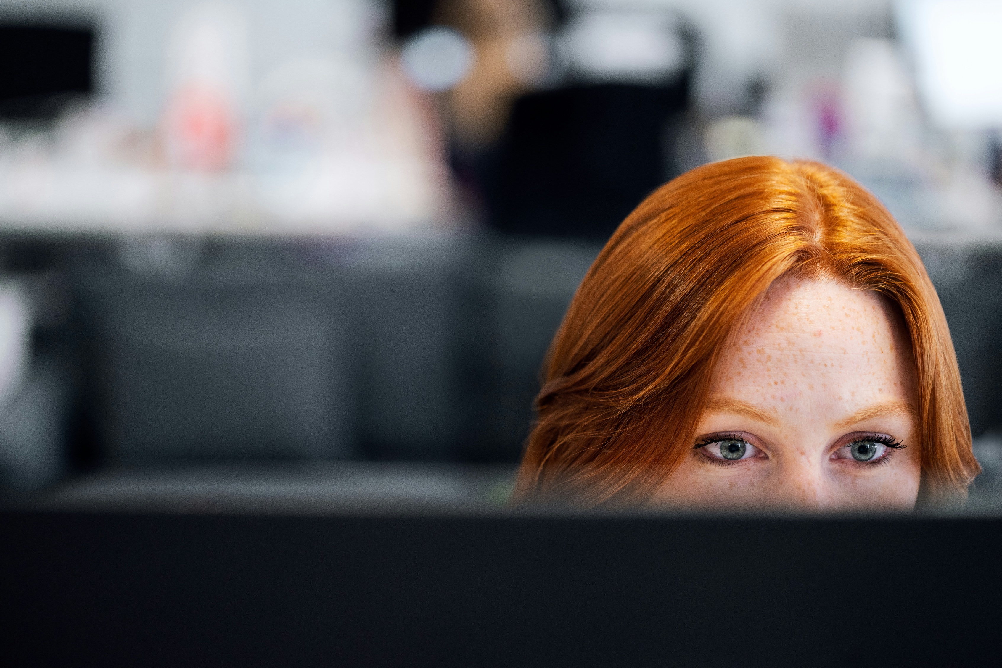 Consultant focused at a monitor